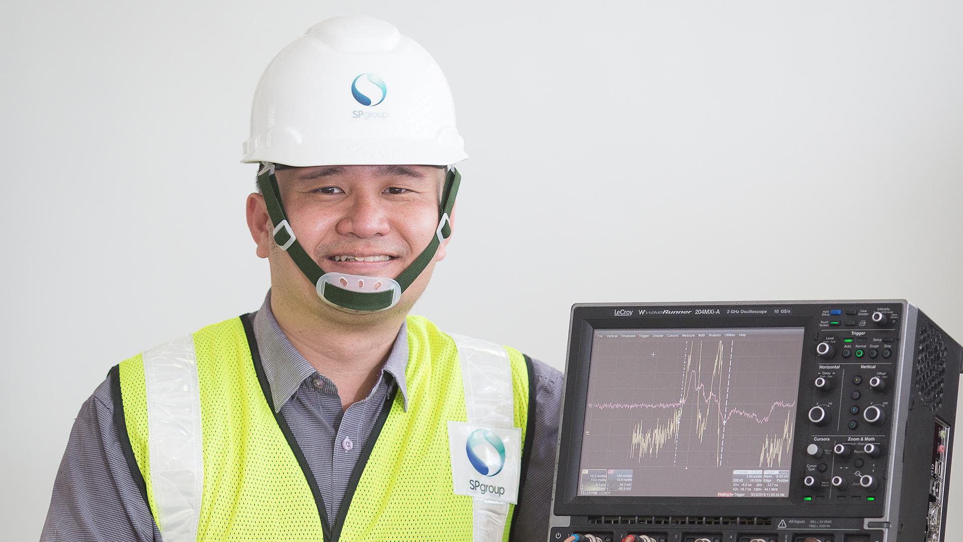 Reading the “pulse” of network equipment, Senior Engineer Dr Lai Kai Xian can tell whether insulation material within the equipment may be breaking down.