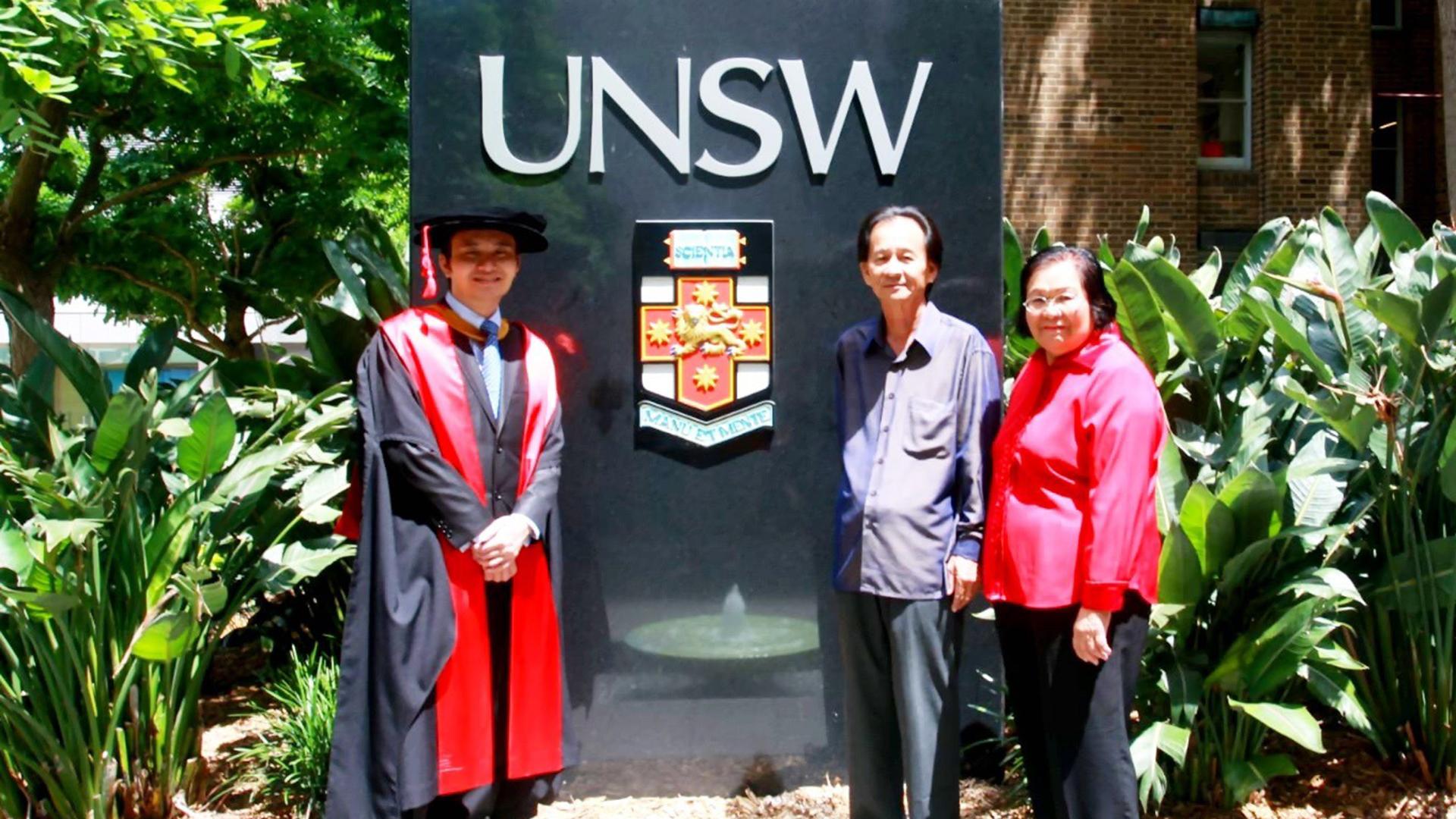 SeniorEngineer Dr Lai Kai Xian (left) with his parents (right) at the 2010 University of New South Wales graduation ceremony. He was awarded a Doctor of Philosophy in Electrical Engineering.