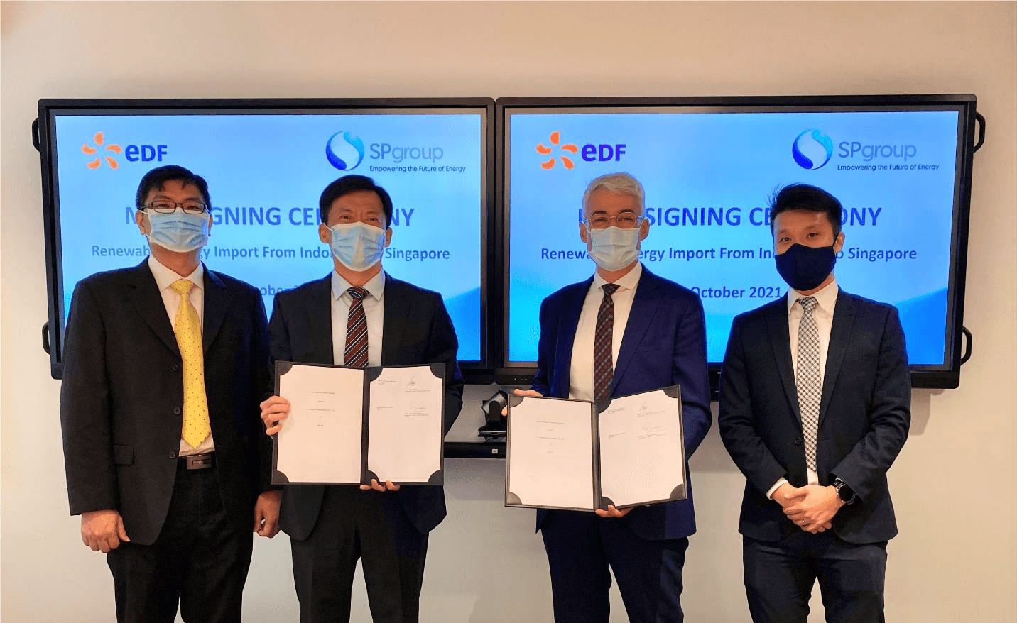 (From left) Brandon Chia, Managing Director of SEA (excl. SG) & Australia in Sustainable Energy Solutions at SP Group; Stanley Huang, SP Group CEO; Jean-Philippe Buisson, Senior Vice President of Asia at EDF International; and Cheang Jian Ming, Business Development Manager at EDF International.